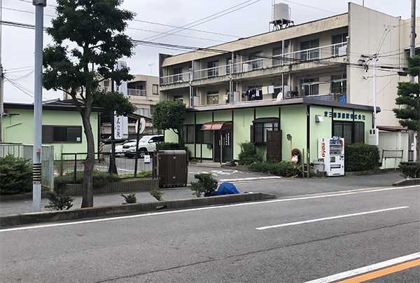 愛三舗道建設社屋